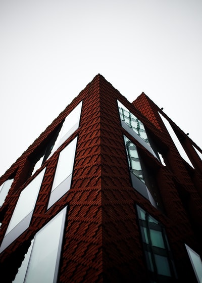 Brown brick red metal framework
